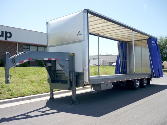 gooseneck curtain side trailer with curtain open
